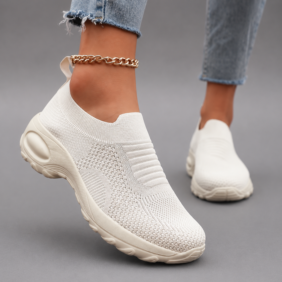 Women’s orthopedic slip-on sneakers with a breathable stretch-knit upper, cushioned footbed and thick lightweight shock-absorbing sole.