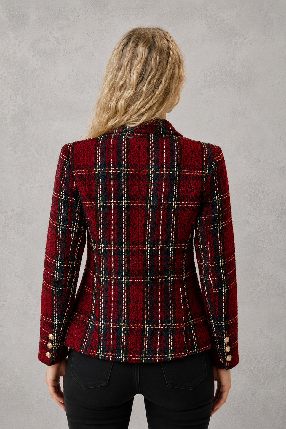 Women’s plaid tweed blazer with a double-breasted front, structured lapel collar, textured woven finish, and tailored silhouette.