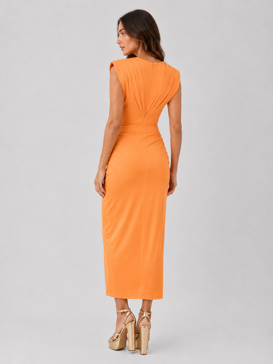 Women's sleeveless pleated maxi dress with a flowy relaxed fit, lightweight breathable fabric, and elegant drape for everyday and occasion wear.