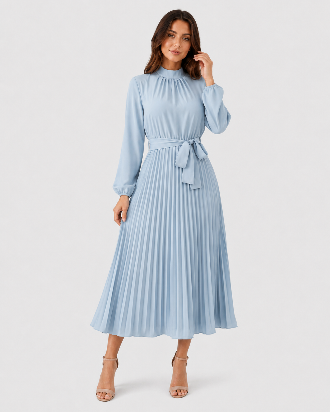 Womenโs long-sleeve pleated midi dress featuring a high gathered neckline, fabric waist belt, and flowing pleated skirt. Designed with a fitted waist and relaxed silhouette for comfortable everyday wear.