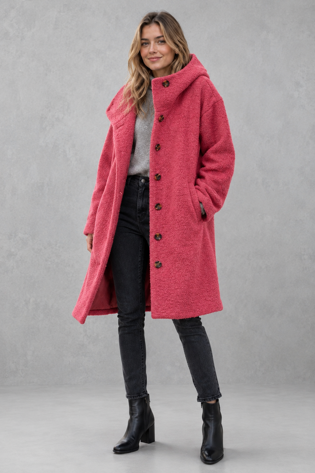 Women’s relaxed fit button coat with a classic overcoat silhouette, long sleeves, lightweight construction, and elegant button-front closure.