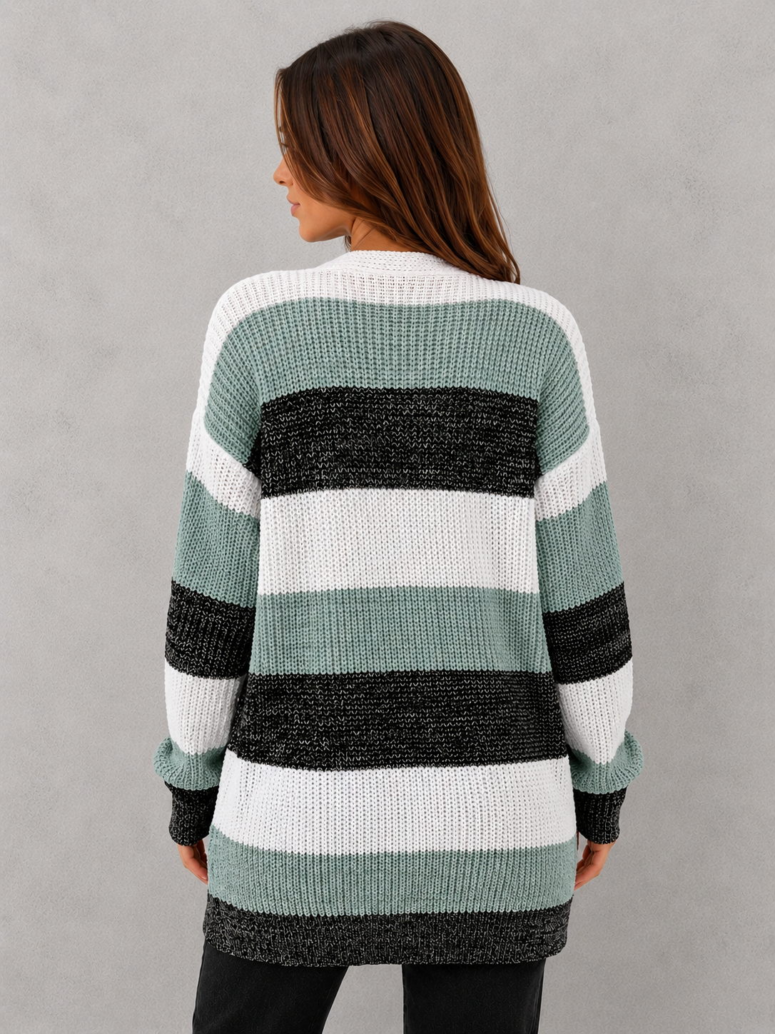 Women's relaxed fit stylish cardigan in soft knit fabric with timeless silhouette, cozy texture, and elegant layering design for autumn styling.