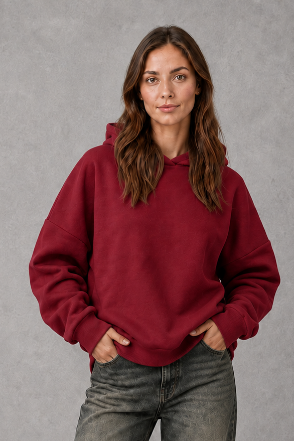 Women’s relaxed fleece pullover hoodie with a soft cotton-blend construction, classic hood, long sleeves and ribbed cuffs and hem.