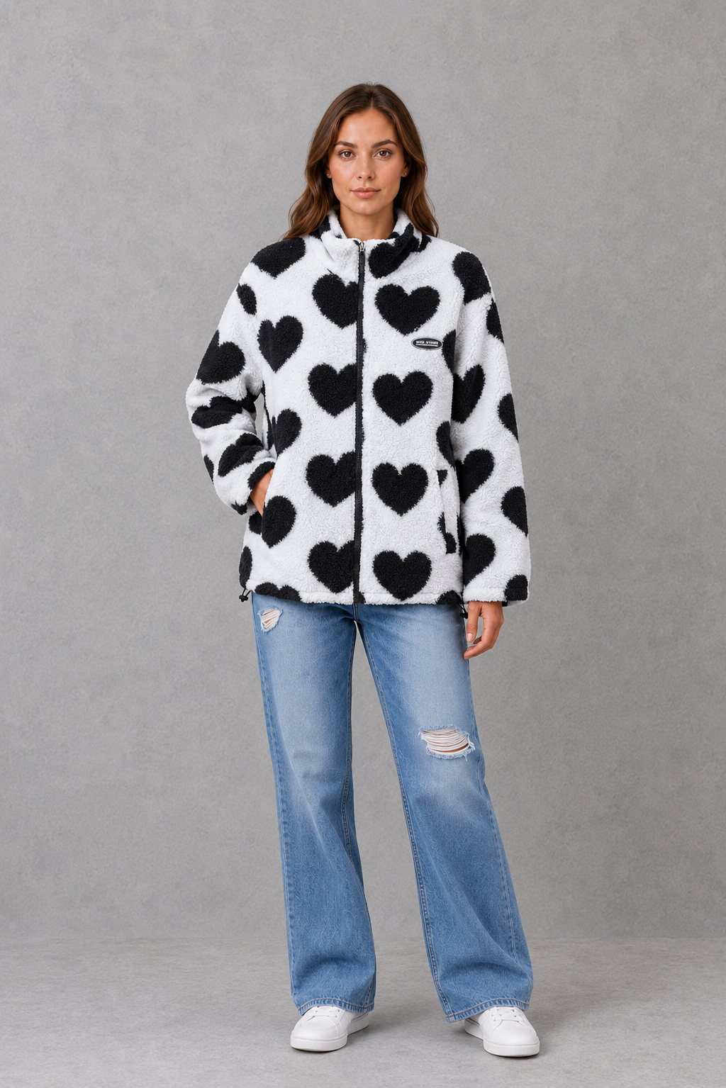 Women’s reversible heart print jacket with a lightweight soft-touch construction, feminine silhouette and versatile 2-in-1 design.