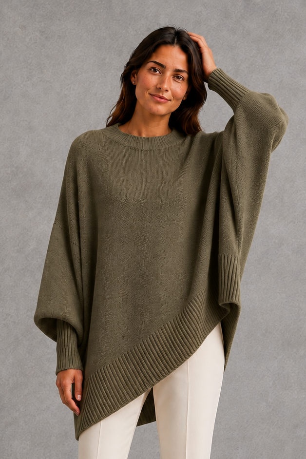 Women’s ribbed mock neck sweater with long sleeves, a relaxed softly draped silhouette and classic solid-color knitted design.