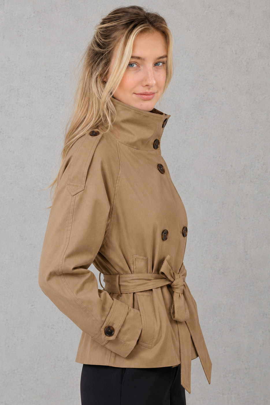 Women’s short belted trench coat with a lightweight tailored silhouette, adjustable waist belt, and classic trench-inspired styling.