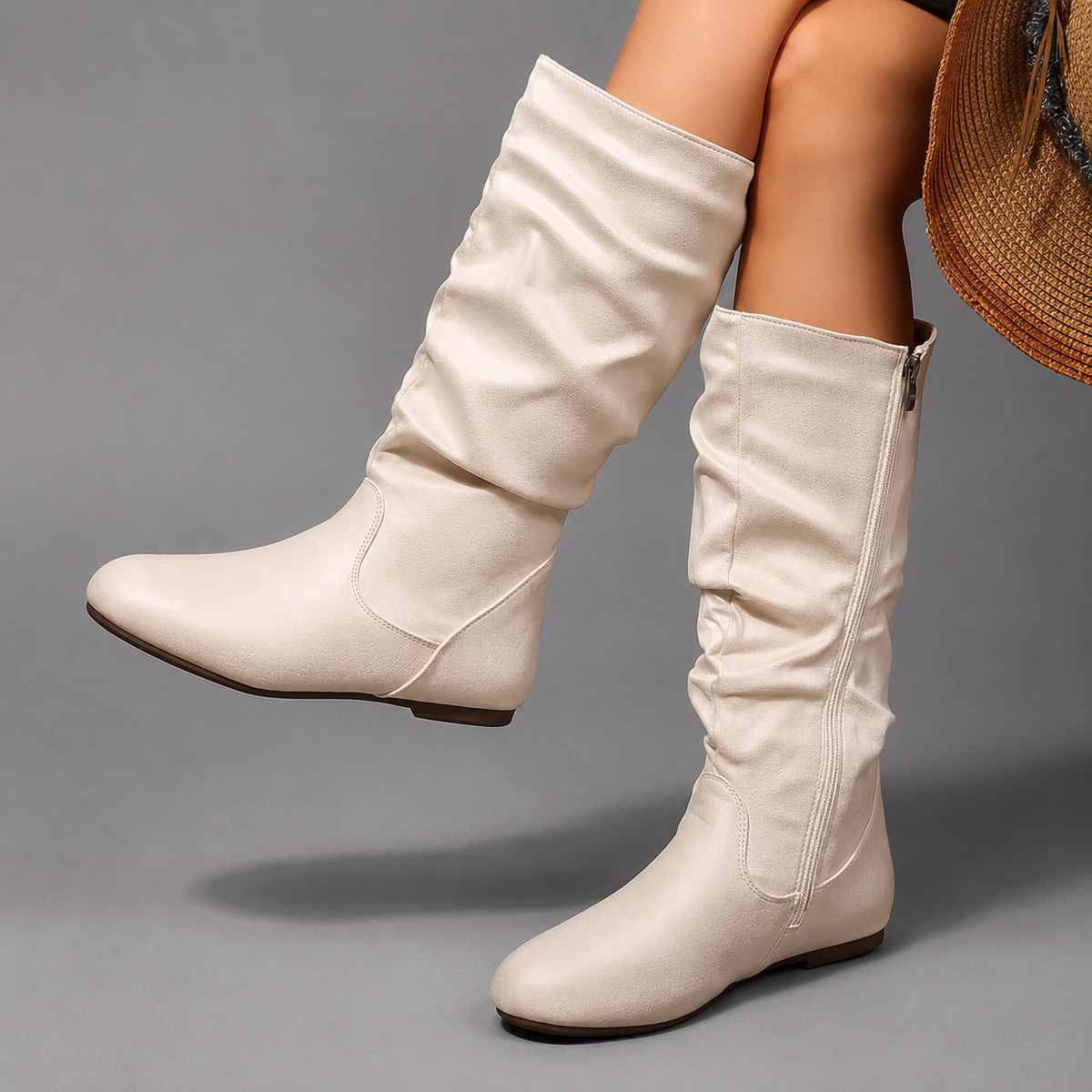 Women’s side-zip mid-calf boots with a soft fabric upper, round toe, low block heel, textile lining, and lightweight EVA sole.