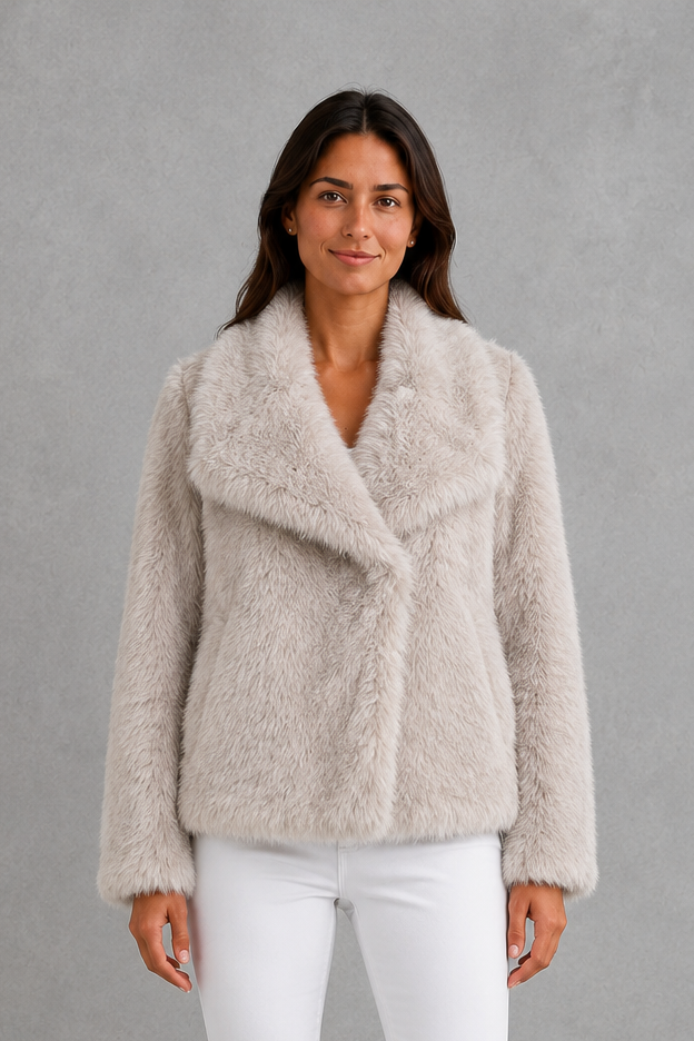 Women’s sleek faux fur jacket with a soft plush exterior, streamlined silhouette, comfortable lining, and elegant regular fit for cold-weather styling.