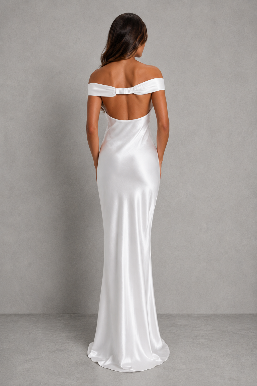 Women’s sleeveless formal maxi dress with a streamlined bodice, flowing floor-length skirt, smooth finish, and elegant minimalist silhouette.