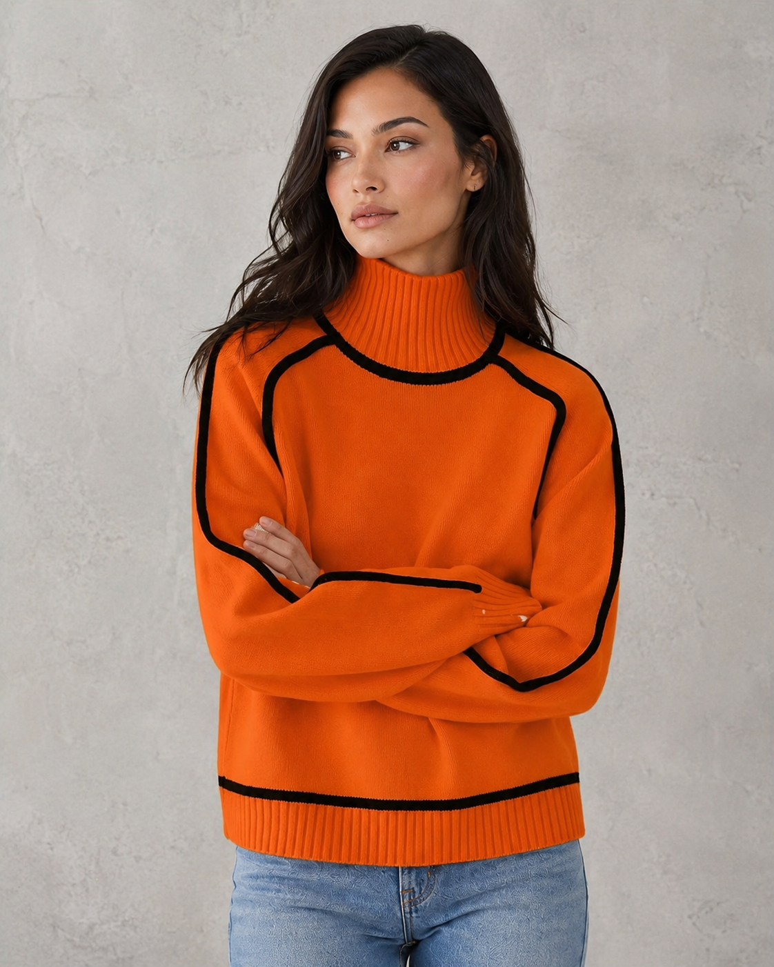 Woman wearing a soft merino wool turtleneck sweater with a relaxed fit and elegant winter styling.