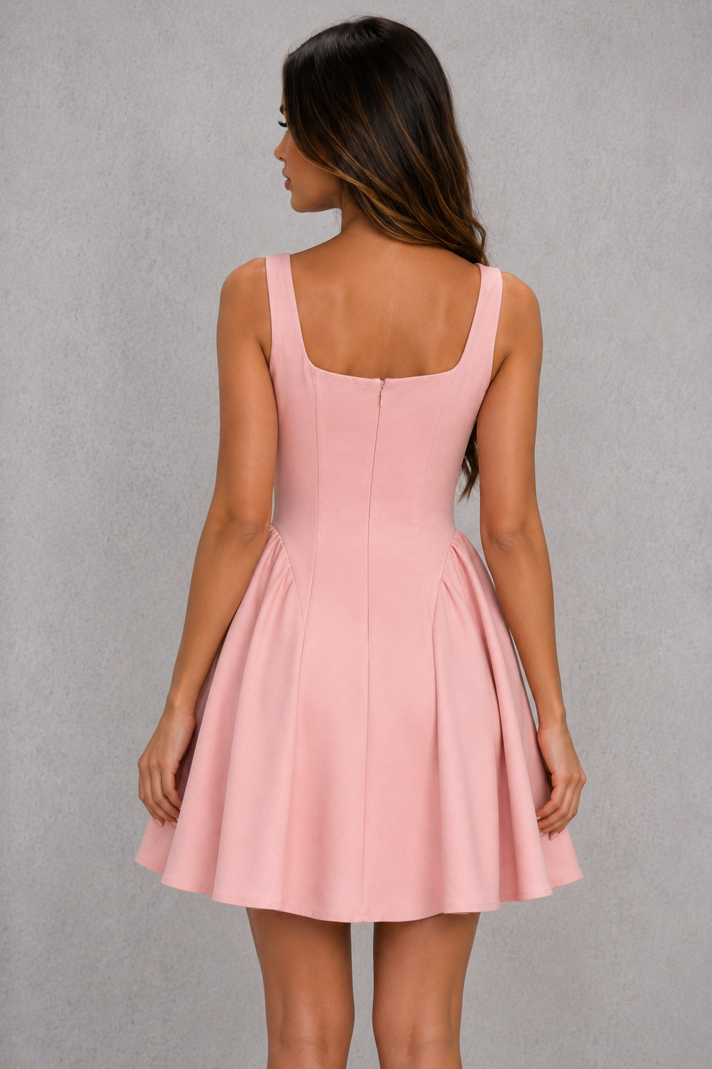 Womenโs pale pink square neck mini dress with delicate shoulder straps, fitted bodice and pleated A-line skirt.