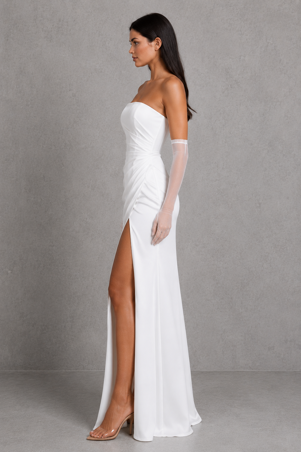 Women's strapless heavy stretch satin maxi dress with a hidden corset, draped bust detail, body-hugging fit, thigh-high split, and flowing skirt, perfect for evening events and formal occasions.