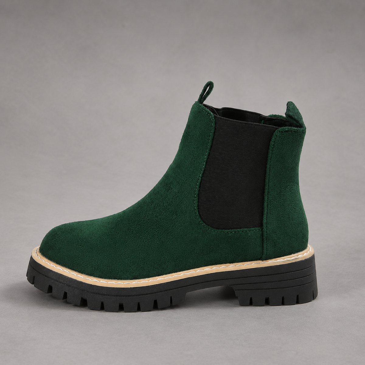 Women’s suede ankle boots with a soft suede upper, classic round toe, supportive mid-height block heel, and durable rubber outsole.