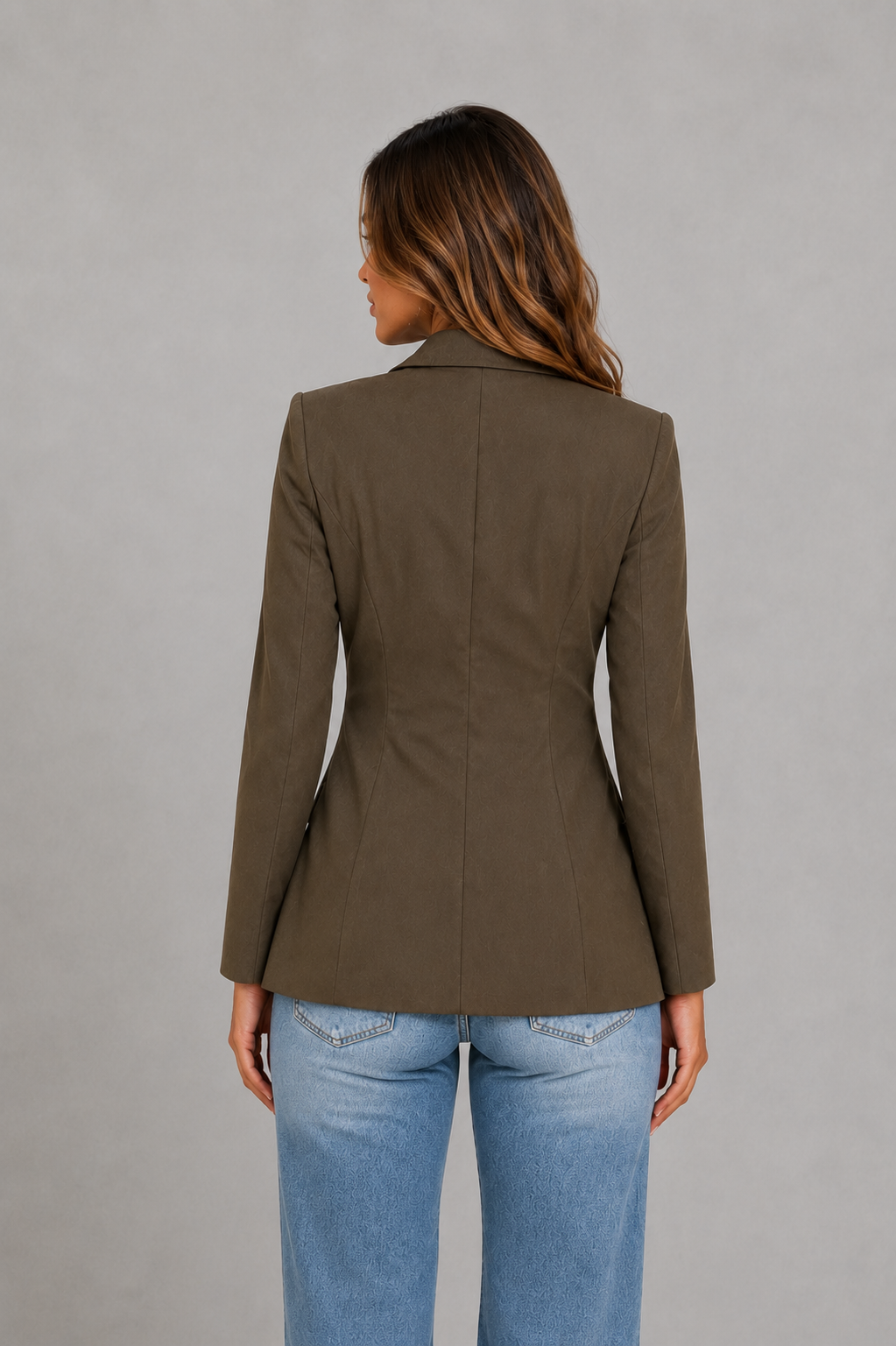 Women’s tailored single-breasted blazer with classic notched lapels, one-button front closure, waist-defining fit, and front flap pockets.