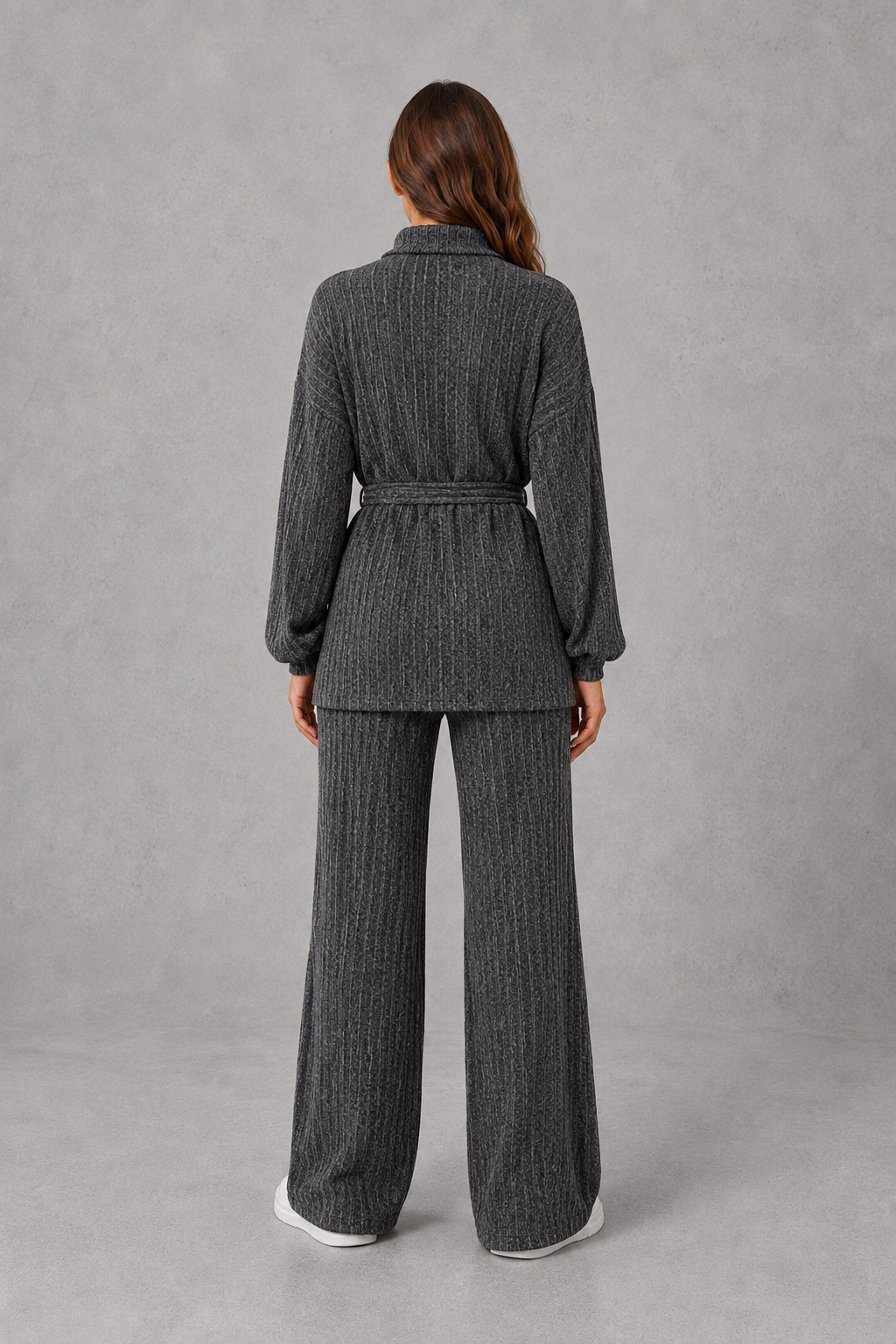 Women’s turtleneck knit two-piece set featuring a long-sleeve ribbed top with an adjustable tie waist and matching wide-leg pants.