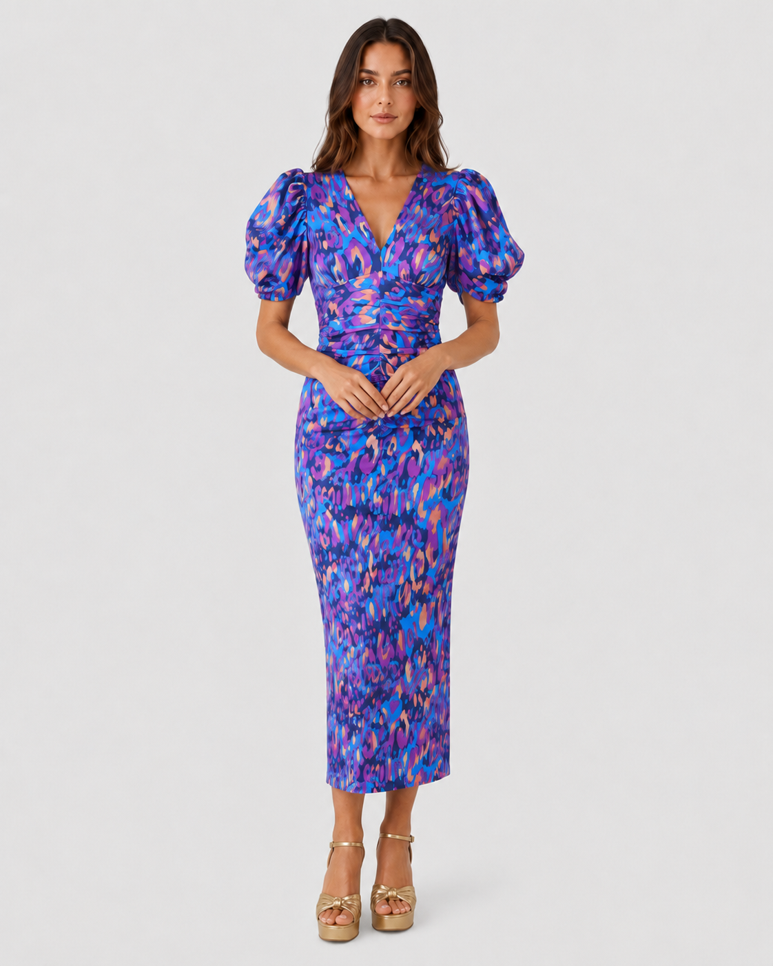 Womenโs Klyne Studios printed midi dress with a V-neckline, structured puff sleeves, relaxed fit, and soft waist shaping for a modern, versatile look.
