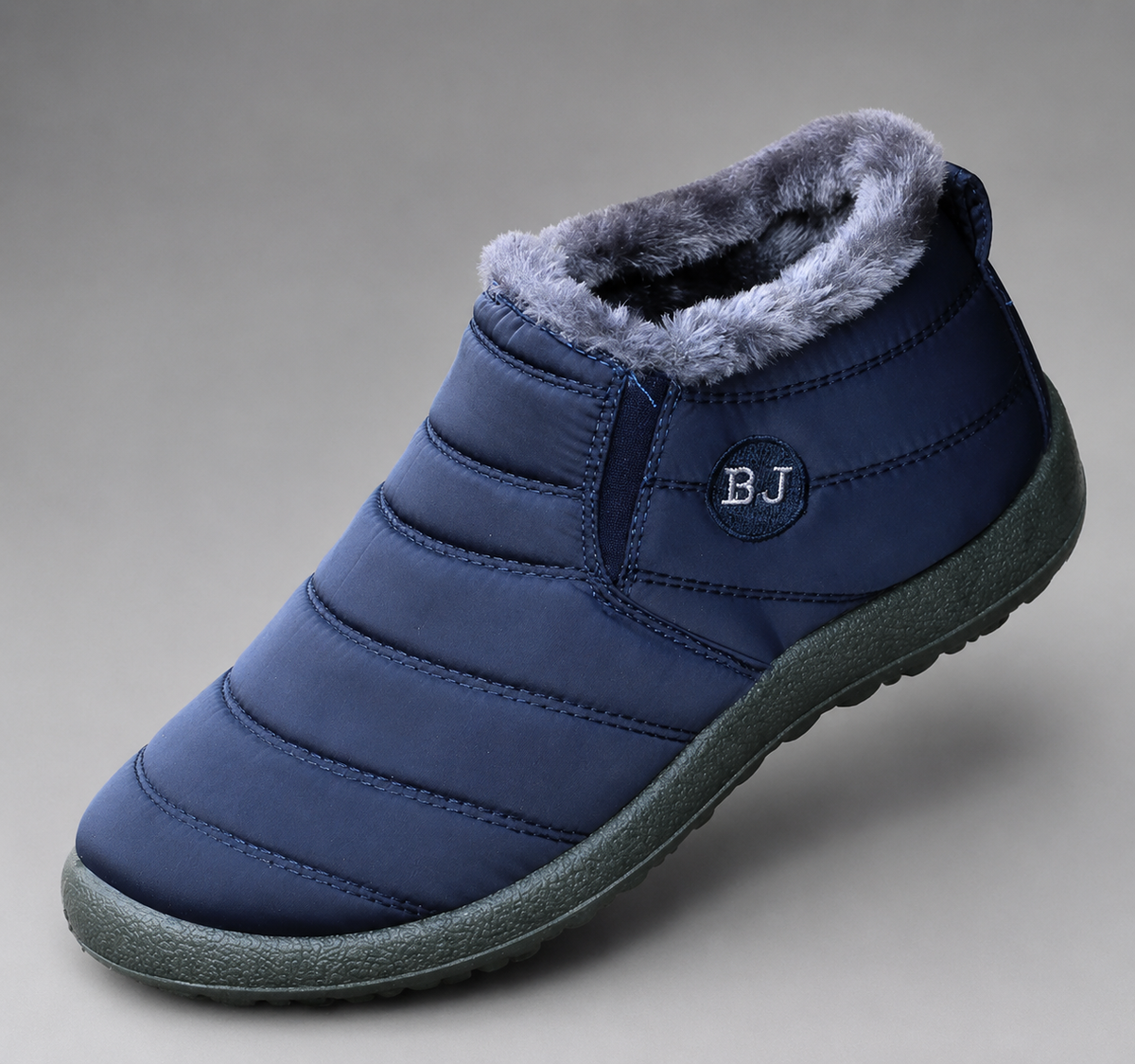 Women’s waterproof snow boots with a quilted upper, warm faux fur lining, round toe, slip-on design, and durable non-slip outsole.