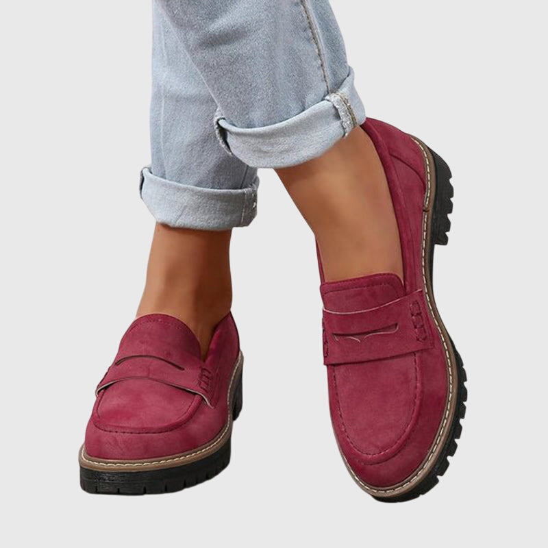 Women’s suede slip-on loafers with classic design and non-slip sole.