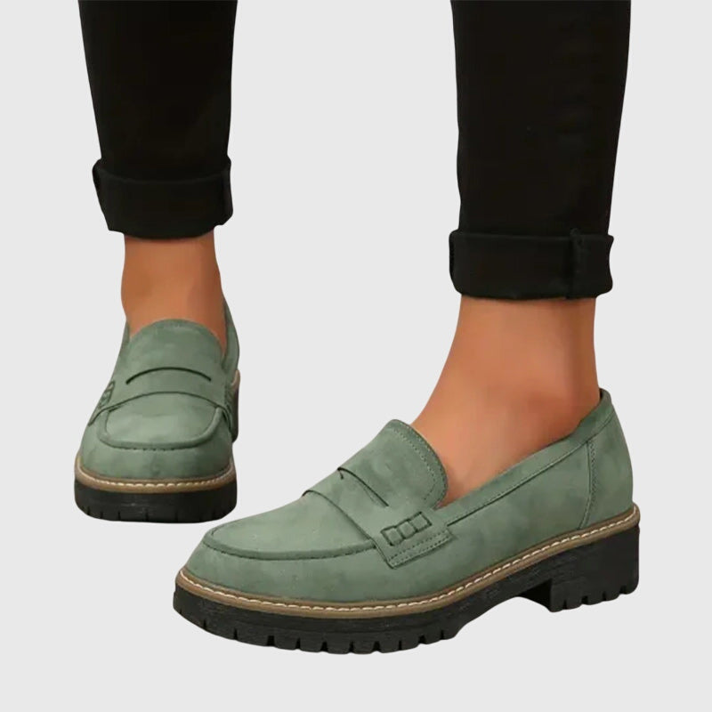 Women’s suede slip-on loafers with classic design and non-slip sole.