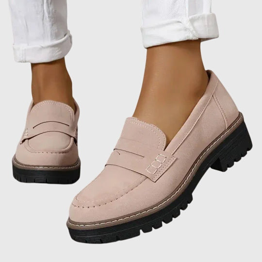 Women’s suede slip-on loafers with classic design and non-slip sole.