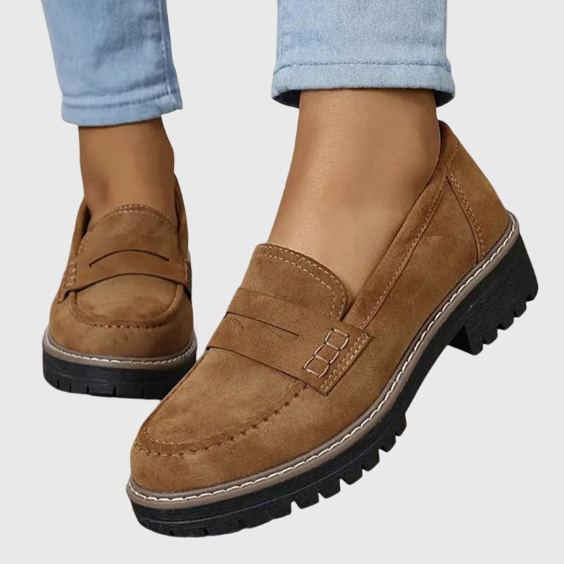 Women’s suede slip-on loafers with classic design and non-slip sole.