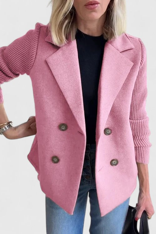 Women’s tailored blazer jacket with contrast sleeves and double-breasted front.