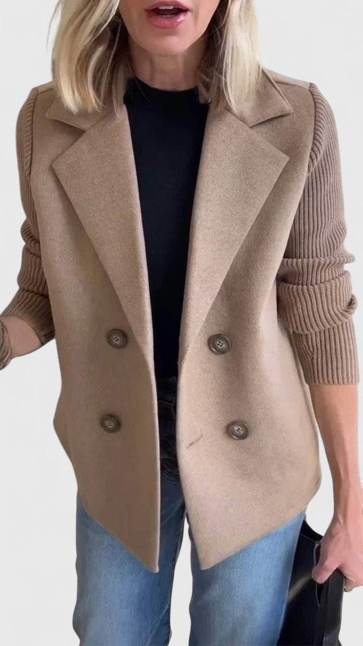 Women’s tailored blazer jacket with contrast sleeves and double-breasted front.
