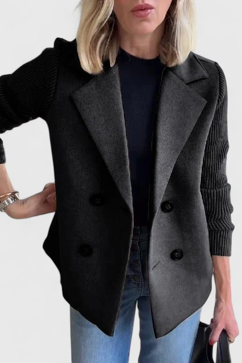 Women’s tailored blazer jacket with contrast sleeves and double-breasted front.