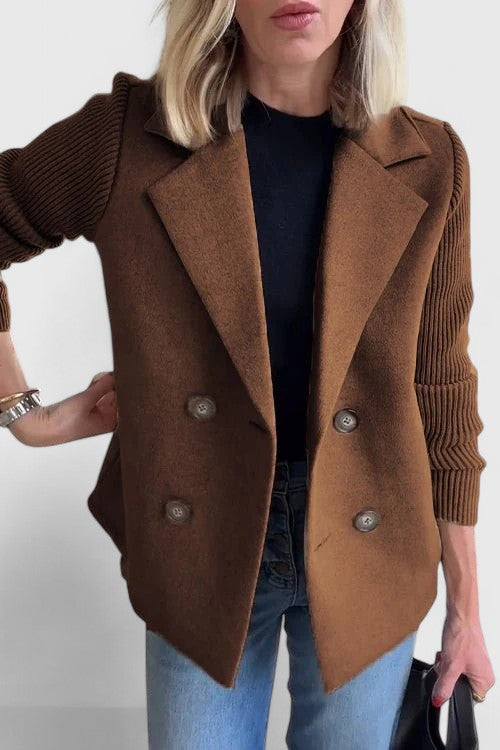 Women’s tailored blazer jacket with contrast sleeves and double-breasted front.