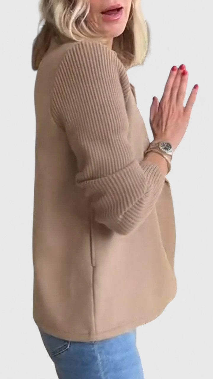 Women’s tailored blazer jacket with contrast sleeves and double-breasted front.