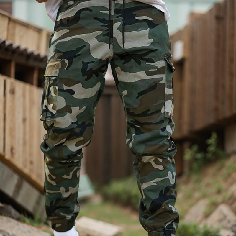 Men’s durable camo cargo work pants with multiple pockets, straight-leg fit, and rugged cotton-polyester fabric for work, outdoor activities, and everyday wear.