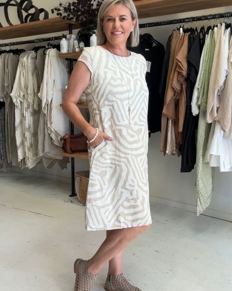 Women’s cotton A-line vintage dress with flared sleeves and relaxed fit.