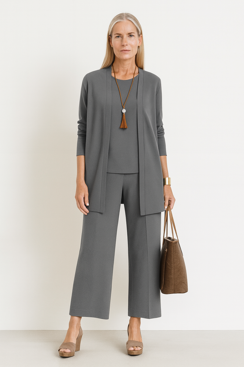 Women’s elegant three-piece outfit set with relaxed fit and lightweight fabric.