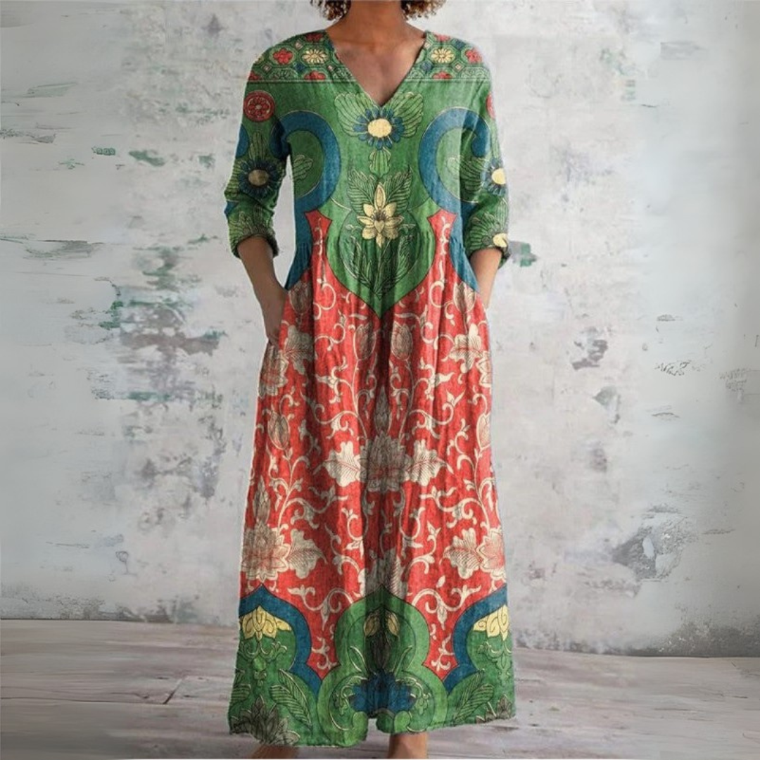 Women’s classic summer floral maxi dress with V-neckline, long sleeves, and flowing ankle-length silhouette for timeless style and comfort.