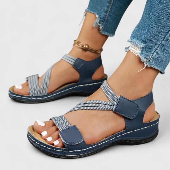 Women’s cushioned support sandals with structured footbed designed for stable and comfortable everyday walking.