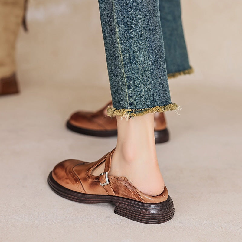 Women’s leather Mary Jane shoes with strap and cushioned sole designed for comfortable everyday walking.