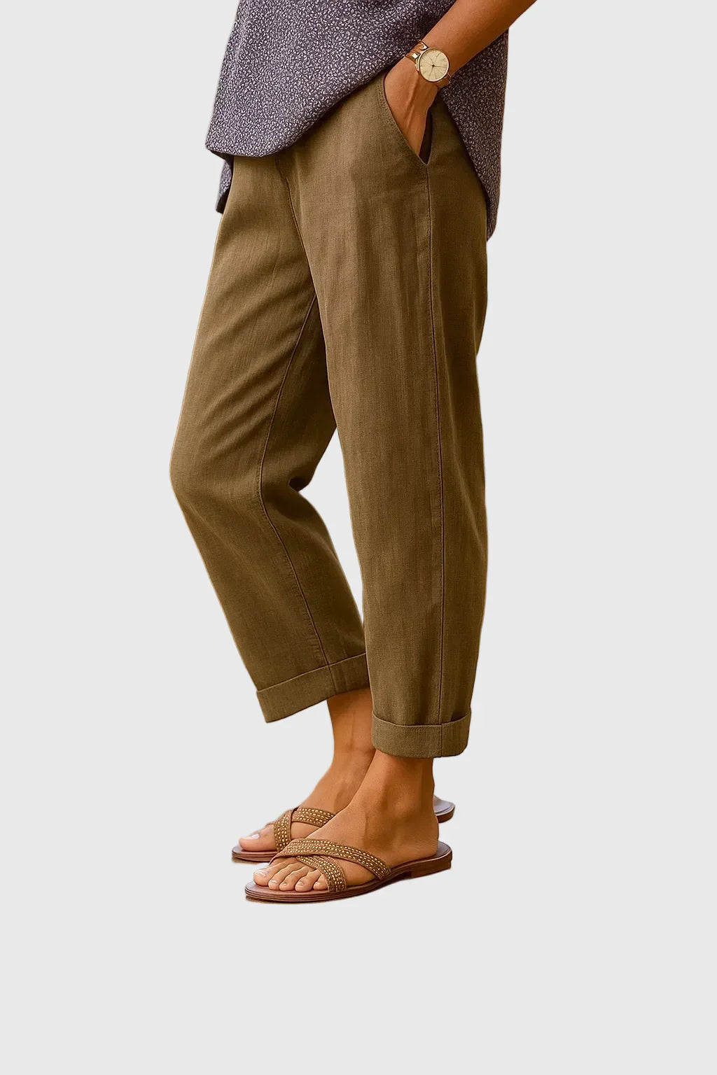 Women’s lightweight relaxed-fit pants with breathable fabric, elastic waistband, and tapered leg for comfortable everyday style.