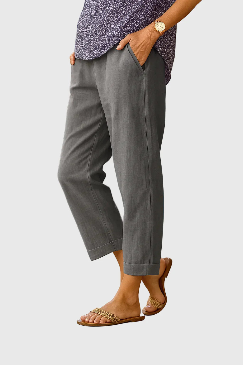 Women’s lightweight relaxed-fit pants with breathable fabric, elastic waistband, and tapered leg for comfortable everyday style.