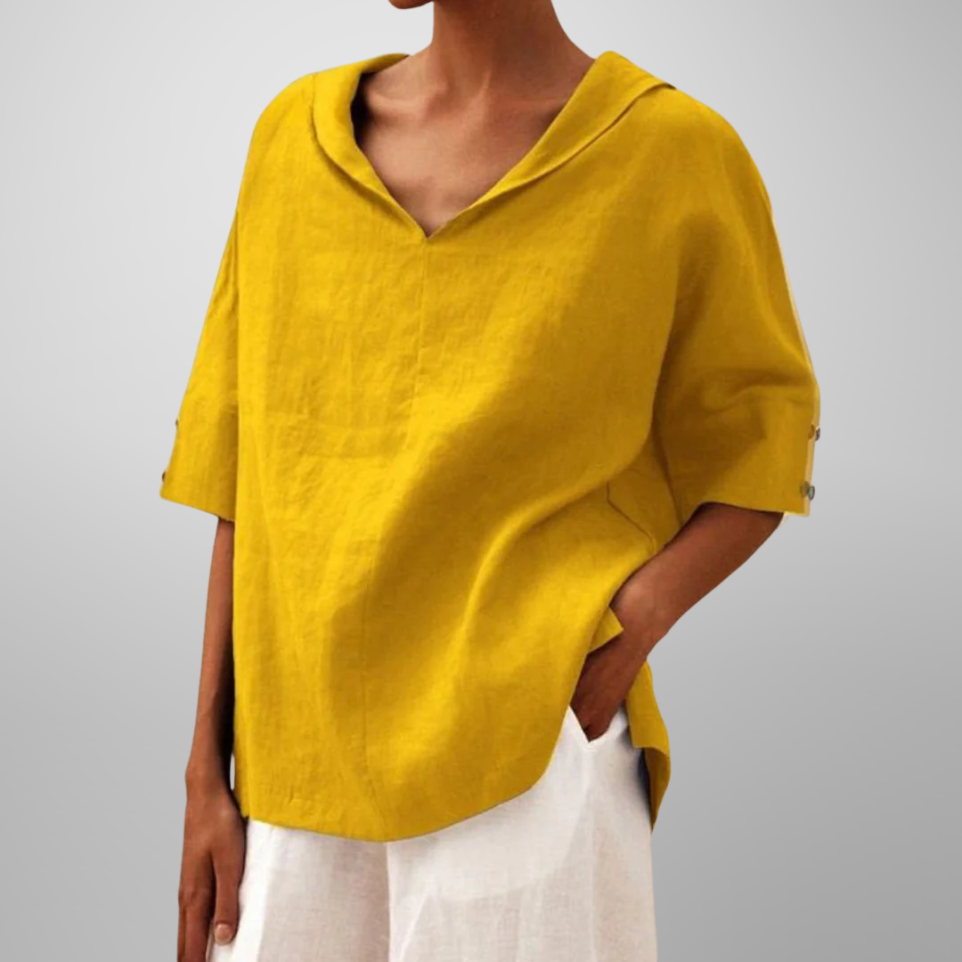 Women’s relaxed everyday blouse with soft drape, breathable fabric, and timeless minimal design for versatile styling.