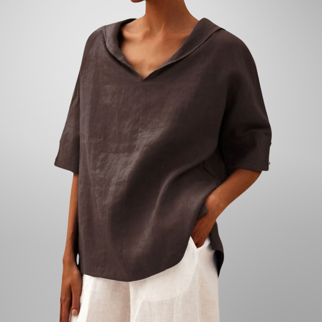 Women’s relaxed everyday blouse with soft drape, breathable fabric, and timeless minimal design for versatile styling.