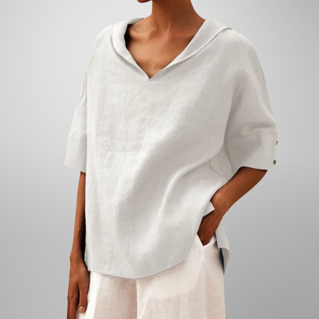 Women’s relaxed everyday blouse with soft drape, breathable fabric, and timeless minimal design for versatile styling.