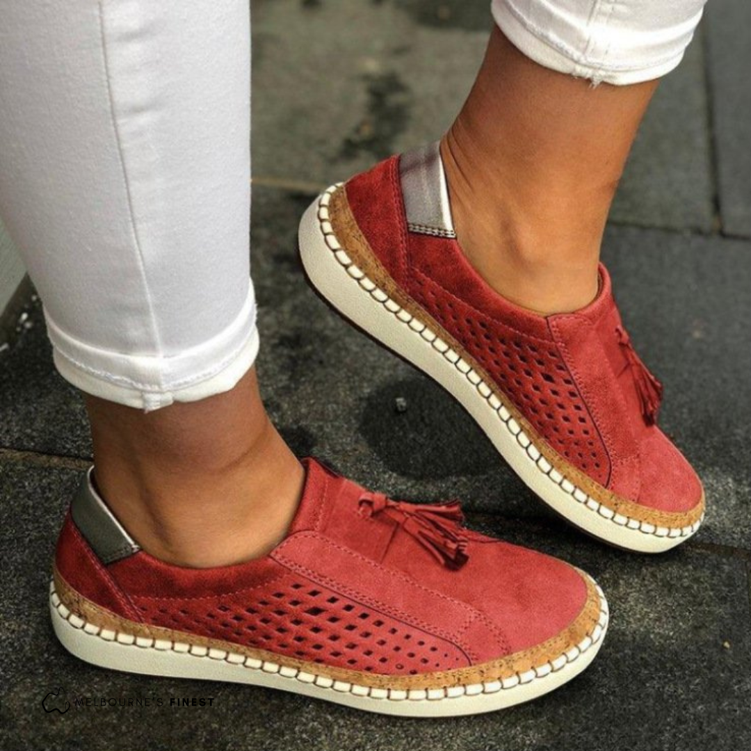 Women’s comfortable slip-on sneakers with breathable fabric and cushioned sole for everyday wear.