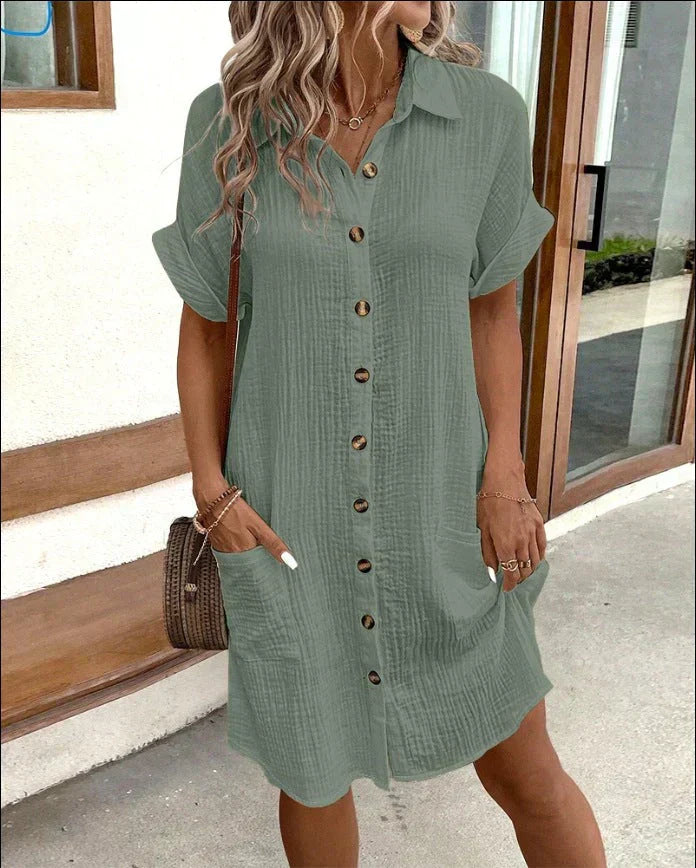Women’s casual polo dress with collared neckline, breathable fabric, and functional pockets for everyday wear.