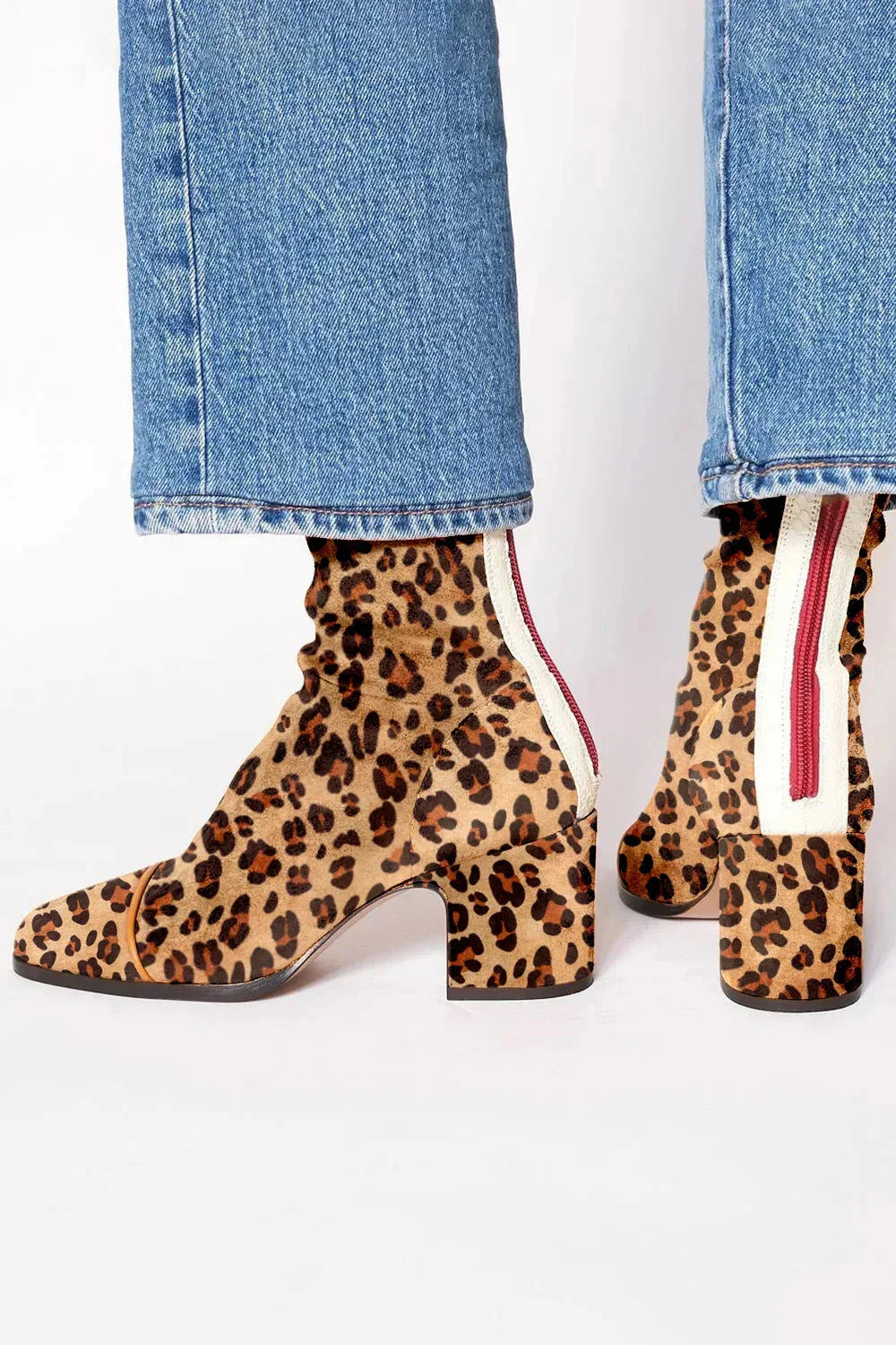 Women’s suede ankle boots with stable block heel and cushioned insole designed for comfortable everyday wear.