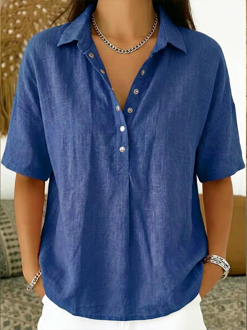 Women’s summer blouse with classic collar, button placket, and relaxed fit, ideal for casual and versatile summer styling.