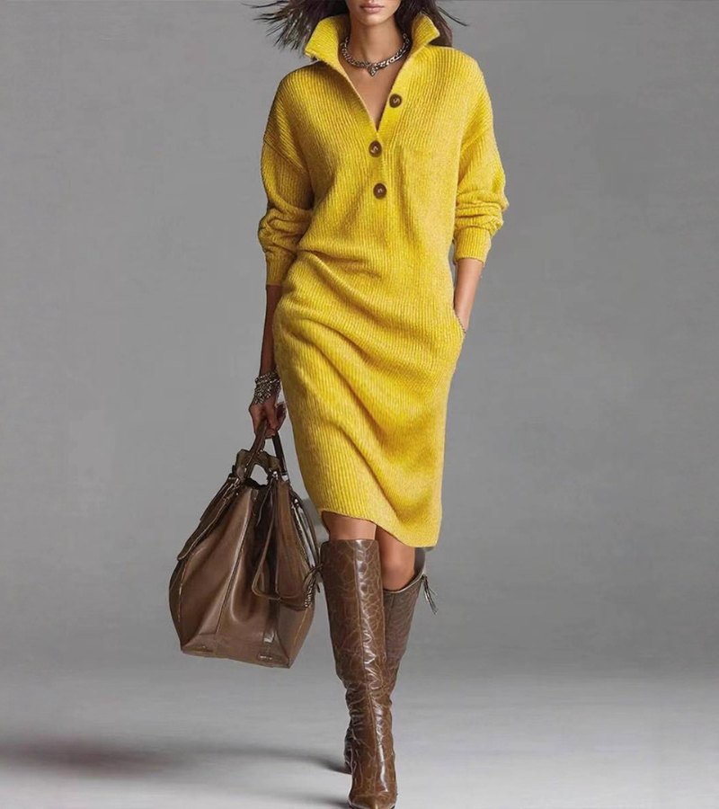 Woman wearing a soft knit long sleeve dress with high collar and side pockets