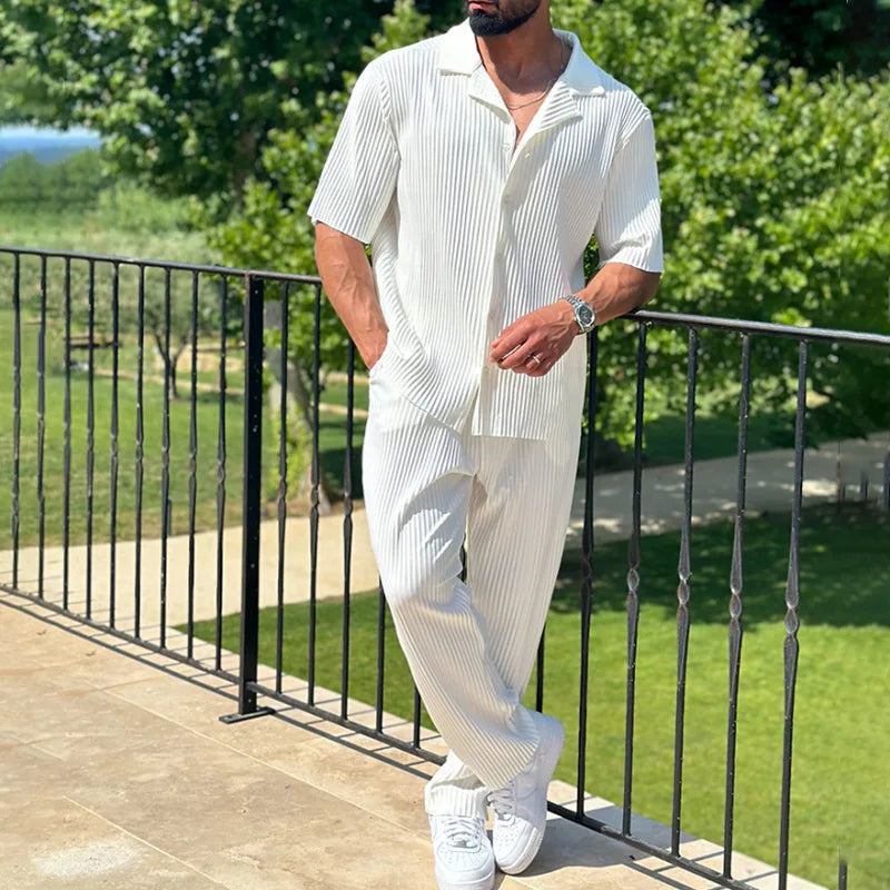 Men’s pleated two piece set with camp collar short sleeve shirt and straight leg trousers in lightweight textured fabric