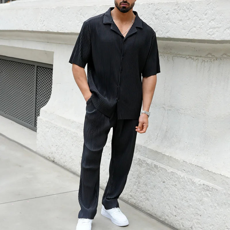 Men’s pleated two piece set with camp collar short sleeve shirt and straight leg trousers in lightweight textured fabric