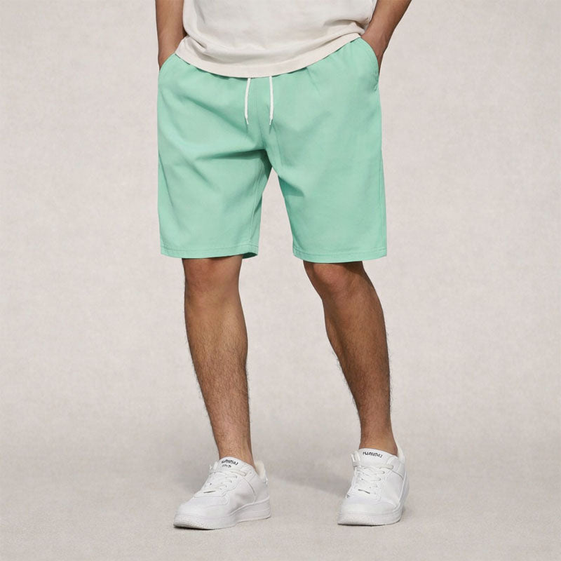 Menโs straight fit elastic waist shorts with drawstring and side pockets for casual summer wear