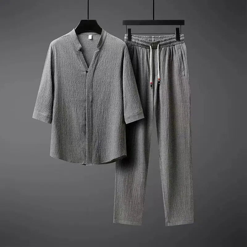 Menโs linen two piece set with V-notch collar shirt and elastic waist trousers for relaxed summer wear